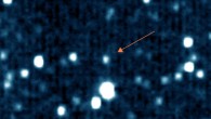 This false color image shows the minor planet/plutino 1994 JR1 (arrow). Image credit: NASA / Johns Hopkins University Applied Physics Laboratory / Southwest Research Institute.