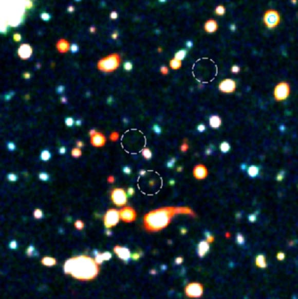 This image from Subaru Telescope shows three submillimeter galaxies (circles) in the protocluster SSA22. Image credit: ALMA / ESO / NAOJ / NRAO / H. Umehata, University of Tokyo.