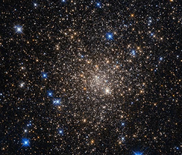 This image from Hubble’s Wide Field and Planetary Camera 2 shows the heavily obscured globular cluster Terzan 1. Image credit: ESA / NASA / Judy Schmidt, www.geckzilla.com.