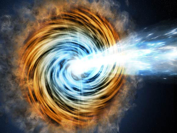 Blazars are the most common sources detected by NASA’s Fermi telescope. As matter falls toward a supermassive black hole at the galaxy’s center, some of it is accelerated outward at nearly the speed of light along jets pointed in opposite directions. When one of the jets happens to be aimed in the direction of Earth, as illustrated here, the galaxy appears especially bright and is classified as a blazar. Image credit: M. Weiss / CfA.
