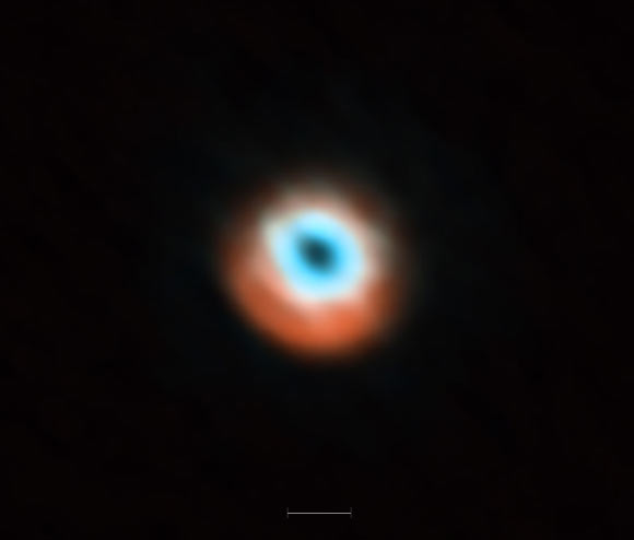 This image from the Atacama Large Millimeter/submillimeter Array combines a view of the dust around the young star HD 135344B (orange) with a view of the gaseous material (blue). The smaller hole in the inner gas is a sign of the presence of a young exoplanet clearing the disc. The bar at the bottom of the image indicates the diameter of the orbit of Neptune in the Solar System. Image credit: ALMA / ESO / NAOJ / NRAO.