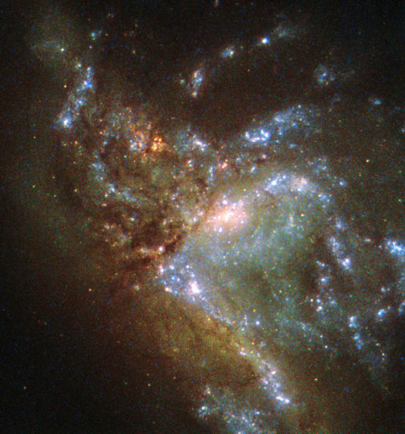 This image from Hubble shows the interacting star-forming galaxy system NGC 6052, which is located 228 million light-years from Earth. Image credit: NASA / ESA / Hubble / Judy Schmidt, www.geckzilla.com.