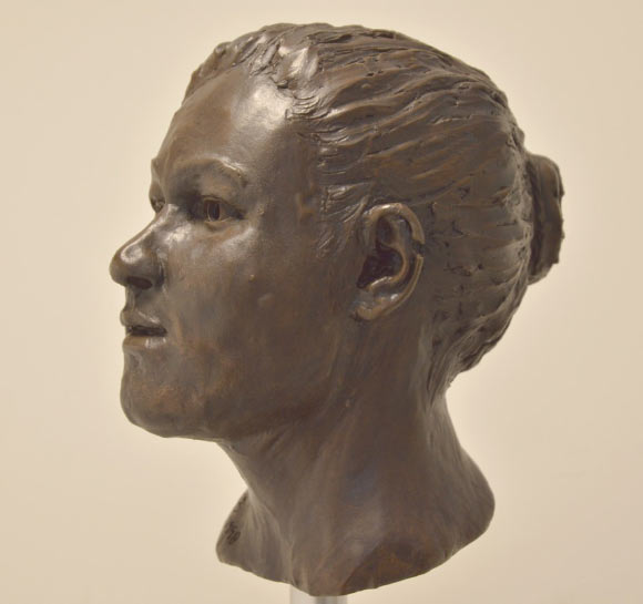 Reconstruction of Ballynahatty Neolithic skull by Elizabeth Black. Her genes tell us she had black hair and brown eyes. Image credit: Barrie Hartwell.