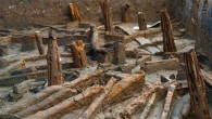 Cambridge Archaeological Unit scientists have unearthed the charred wooden roof structure of a 3,000-year-old round house. Image credit: Cambridge Archaeological Unit.