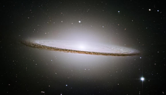 This image from Hubble shows the Sombrero Galaxy (also known as Messier 104 or NGC 4594), an unbarred spiral galaxy located about 29 million light-years away. Image credit: NASA / Hubble Heritage Team.