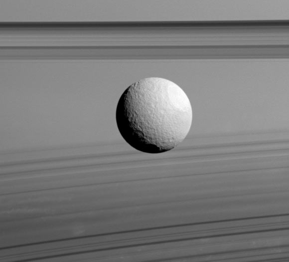 This image shows the Saturn’s icy moon Tethys. Image credit: NASA / JPL-Caltech / Space Science Institute.