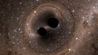 The collision of two black holes is seen in this still from a computer simulation. Image credit: SXS.