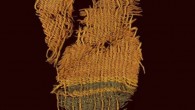 A fine wool textile dyed red and blue, found at Timna. The textile used the various colors of natural animal hair to create black and orange-brown colors for decorative bands. Image credit: Clara Amit / Israel Antiquities Authority.