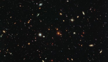 This Hubble image shows thousands of galaxies swimming in the inky blackness of space; a few foreground stars from our Milky Way Galaxy are also visible. Image credit: NASA / ESA / HST Frontier Fields Team / STScI / Judy Schmidt, www.geckzilla.com.