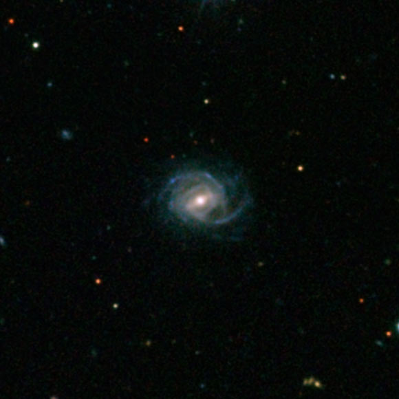 This galaxy, named SDSS J094700.08+254045.7, is one of the biggest and brightest super spirals; its starry disk and spiral arms stretch about 320,000 light-years across, or more than three times the breadth of our Milky Way Galaxy. Image credit: SDSS.