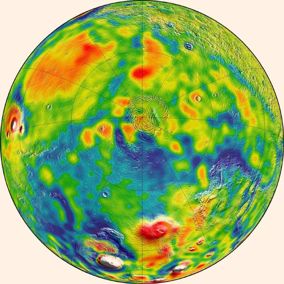 A map of Martian gravity looking down on the North Pole (center): white and red are areas of higher gravity; blue indicates areas of lower gravity. Image credit: MIT / UMBC-CRESST / GSFC.
