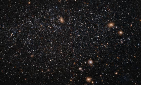This image from the NASA/ESA Hubble Space Telescope shows the nearby irregular dwarf galaxy Leo A. Image credit: NASA / ESA / Hubble / Judy Schmidt, www.geckzilla.com.