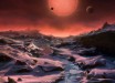 This artist’s impression shows an imagined view from the surface one of the three exoplanets orbiting the ultracool dwarf star TRAPPIST-1 38.8 light-years from Earth. These alien worlds have sizes and temperatures similar to those of Venus and Earth. In this view one of the inner planets is seen in transit across the disc of TRAPPIST-1. Image credit: M. Kornmesser / ESO.
