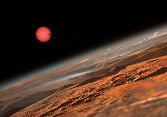 This artist’s impression shows an imagined view from close to one of the three planets orbiting TRAPPIST-1. Image credit: M. Kornmesser / ESO.