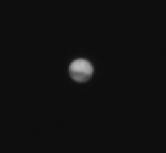 ExoMars acquired its first image of Mars on June 13. The line-of-sight distance to the planet was 25.5 million miles (41 million km). The Tharsis region of Mars, home to the planet’s largest volcanoes, faces the spacecraft in this view. Image credit: ESA / Roscosmos / ExoMars / CaSSIS / UniBE.