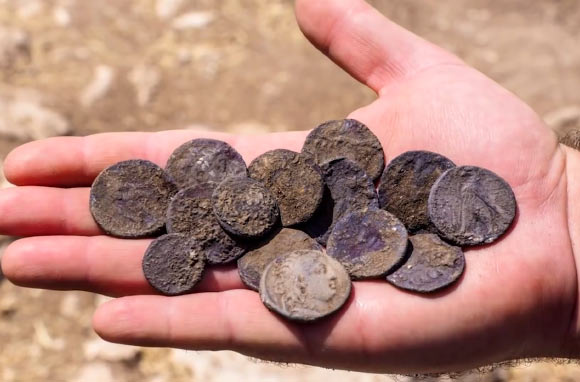 The cache of silver coins found in the ruins of an ancient estate house in Modi’in, Israel. Image credit: Assaf Peretz / Israel Antiquities Authority.