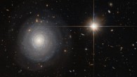 This image from Hubble’s Advanced Camera for Surveys is likely the best of the spiral galaxy LEDA 56779. The brilliant object at right is a star in our Milky Way Galaxy. Image credit: NASA / ESA / Hubble / N. Grogin, STScI.