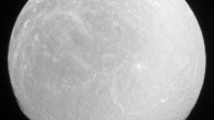 Water ice on Rhea’s surface makes it bright in full sunlight. North on Rhea is up and rotated 36 degrees to the right. Image credit: NASA / JPL-Caltech / Space Science Institute.