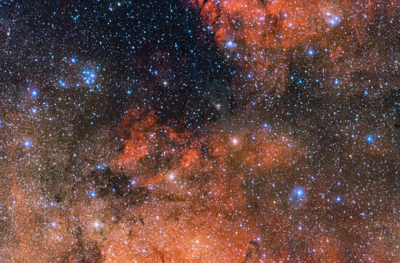 Messier 18 (upper left) and its surroundings. This image was captured by the OmegaCAM, a camera installed on the VLT Survey Telescope. Image credit: ESO.