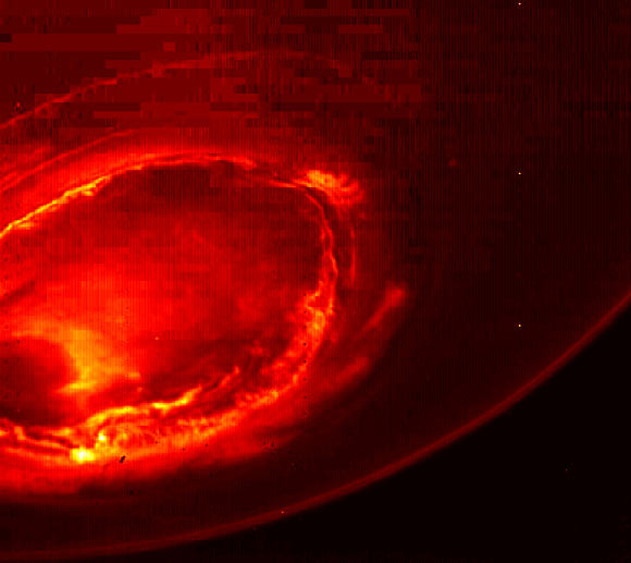 This infrared image gives an unprecedented view of the southern aurora of Jupiter. The gas giant’s southern aurora can hardly be seen from Earth due to our home planet’s position in respect to Jupiter’s south pole. Juno’s unique polar orbit provides the first opportunity to observe this region of the planet in detail. The JIRAM camera acquired the view at wavelengths ranging from 3.3 to 3.6 microns - the wavelengths of light emitted by excited hydrogen ions in the polar regions. The view is a mosaic of three images taken just minutes apart from each other, about four hours after the perijove pass while the spacecraft was moving away from Jupiter. Image credit: NASA / JPL-Caltech / SwRI / MSSS.