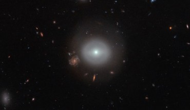 This image snapped by Hubble’s ACS instrument shows PGC 83677, a lenticular galaxy located 300 million light-years away in the constellation of Coma Berenices. Image credit: NASA / ESA / Hubble / Judy Schmidt, www.geckzilla.com.