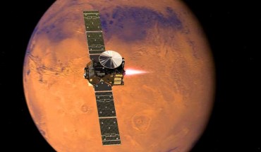 Artist’s impression visualizing the ExoMars 2016 Trace Gas Orbiter, with its thrusters firing, beginning its entry into Mars orbit on October 19, 2016. Image credit: ESA / ATG Medialab.