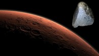 This computer-generated view depicts part of Mars at the boundary between darkness and daylight. At top right is NWA 7034. Image credit: NASA / JPL-Caltech / University of New Mexico / Sci-News.com.