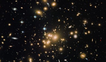 Hubble view of the galaxy cluster Abell 1689. Image credit: NASA / ESA / Hubble Heritage Team / STScI / AURA / J. Blakeslee, Dominion Astrophysical Observatory / H. Ford, JHU.