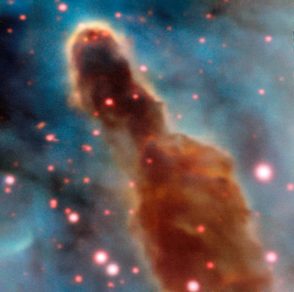 This image, taken by ESO’s Very Large Telescope, shows the region R18 within the Carina Nebula. The massive stars within the star formation region slowly destroy the pillars of dust and gas from which they are born. Image credit: A. McLeod / ESO.