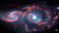 This image, a composite of data from ALMA and the NASA/ESA Hubble Space Telescope, shows a very rare cosmic sight: a pair of interacting galaxies that have taken on an ocular structure. Image credit: ALMA / ESO / NAOJ / NRAO / M. Kaufman.