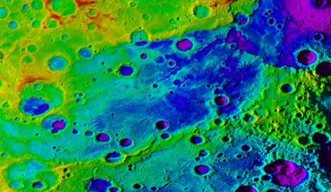 Using colorized topography, Mercury’s ‘great valley’ (dark blue) and Rembrandt impact basin (purple, upper right) are revealed in this high-resolution digital elevation model merged with an image mosaic obtained by NASA’s MESSENGER spacecraft. Image credit: NASA / Johns Hopkins University Applied Physics Laboratory / Carnegie Institution of Washington / DLR / Smithsonian Institution.