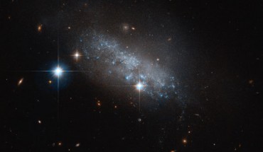 This image, taken with the Advanced Camera for Surveys on board the NASA/ESA Hubble Space Telescope, shows the dwarf irregular galaxy IC 3583. Image credit: NASA / ESA / Hubble.