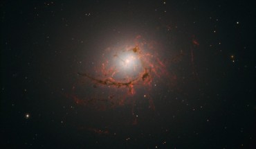 This Hubble image shows the elliptical galaxy NGC 4696. Image credit: NASA / ESA / Hubble / A. Fabian.