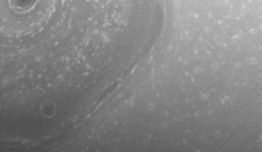 This view from Cassini was obtained about half a day before its first close pass by the outer edges of Saturn’s main rings during its penultimate mission phase. The view shows part of the giant, hexagon-shaped jet stream around the planet’s north pole. Each side of the hexagon is about as wide as Earth. A circular storm lies at the center, at the pole. The image was taken with Cassini’s wide-angle camera on Dec. 3, 2016, at a distance of about 240,000 miles (390,000 km) from Saturn. Image credit: NASA / JPL-Caltech / Space Science Institute.