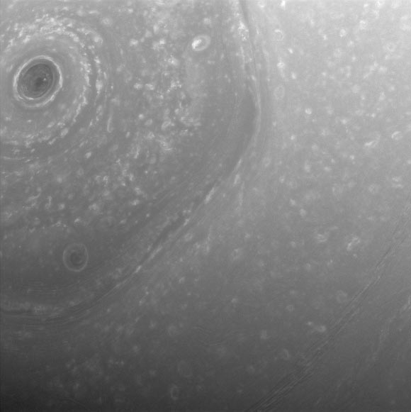 This view from Cassini was obtained about half a day before its first close pass by the outer edges of Saturn’s main rings during its penultimate mission phase. The view shows part of the giant, hexagon-shaped jet stream around the planet’s north pole. Each side of the hexagon is about as wide as Earth. A circular storm lies at the center, at the pole. The image was taken with Cassini’s wide-angle camera on Dec. 3, 2016, at a distance of about 240,000 miles (390,000 km) from Saturn. Image credit: NASA / JPL-Caltech / Space Science Institute.