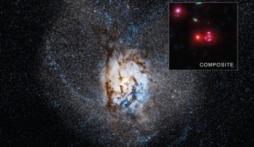 The distorted galaxy in the simulation (main image) results from a collision and merger between two galaxies. Astronomers think such a merger could be the reason why SPT0346-52 is having such a boom of stellar construction. Once the two galaxies collide, gas near the center of the merged galaxy (shown as the bright region in the center of the simulation) is compressed, producing a burst of new stars. The composite inset shows X-ray data from Chandra (blue), short wavelength infrared data from Hubble (green), infrared light from Spitzer (red) at longer wavelengths, and infrared data from ALMA (magenta) at even longer wavelengths. There is no blue at the center of the image, showing that Chandra did not detect any X-rays that could have signaled the presence of a growing black hole. Image credit: X-ray – NASA / CXC / University of Florida / J. Ma et al; optical – NASA / STScI; infrared – NASA / JPL-Caltech; radio – ESO / NAOJ / NRAO / ALMA; simulation - Simons Foundation / Gordon and Betty Moore Foundation / Flatiron Institute / Caltech / C. Hayward & P. Hopkins.