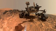 This low-angle self-portrait of NASA’s Curiosity rover shows the vehicle at the site from which it reached down to drill into a rock target called ‘Buckskin’ on lower Mount Sharp. The selfie combines several component images taken by Curiosity’s Mars Hand Lens Imager (MAHLI) on Aug. 5, 2015, during 1065 Sol (Martian day) of the rover’s work on Mars. For scale, the rover’s wheels are 20 inches (50 cm) in diameter and about 16 inches (40 cm) wide. Image credit: NASA / JPL-Caltech / MSSS.
