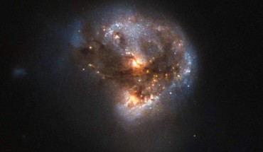 This image shows the megamaser galaxy LEDA 58817, which lies in the constellation Ophiuchus, about 370 million light-years away. Image credit: NASA / ESA / Hubble / Judy Schmidt, www.geckzilla.com.