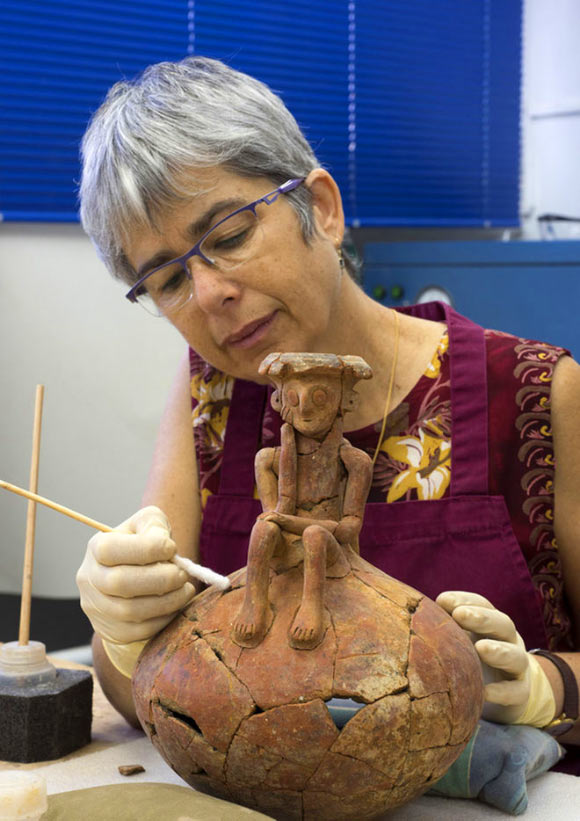 The 3,800-year-old jug, which was broken when it was found, being restored in the laboratories of the Israel Antiquities Authority in Jerusalem, Israel. Image credit: Clara Amit / Israel Antiquities Authority.