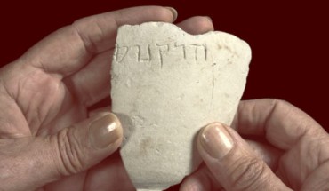 The fragment of the 2,100-year-old stone bowl, which is engraved with the name Hyrcanus. Image credit: Clara Amit / Israel Antiquities Authority.