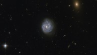 This Hubble Advanced Camera for Surveys image shows the spiral galaxy LEDA 1245565, which lies in the constellation Virgo, about one billion light-years away. Image credit: NASA / ESA / Hubble / Judy Schmidt, www.geckzilla.com.
