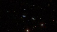This SDSS image shows a group of dwarf galaxies that are gravitationally bound together. The detection of seven such groups lends support to the idea that large galaxies formed by the collision and merger of smaller galaxies in the early Universe. Image credit: Sloan Digital Sky Survey.