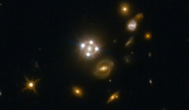 HE0435-1223, located in the centre of this wide-field image, is among the five best lensed quasars discovered to date. The foreground galaxy creates four almost evenly distributed images of the distant quasar around it. Image credit: NASA / ESA / Hubble / S.H. Suyu et al.