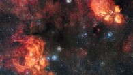 This spectacular image from ESO’s VLT Survey Telescope shows the Cat’s Paw Nebula (upper right) and the Lobster Nebula (lower left); these dramatic objects are regions of active star formation where the hot young stars are causing the surrounding hydrogen gas to glow red; the very rich field of view also includes dark clouds of dust; with around two billion pixels this is one of the largest images ever released by ESO. Image credit: ESO.