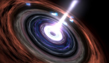 In the heart of an active galaxy, matter falling toward a supermassive black hole creates jets of particles traveling near the speed of light. For active galaxies classified as blazars, one of these jets beams almost directly toward Earth. Image credit: NASA / Goddard Space Flight Center Conceptual Image Lab.