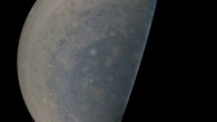 Cyclones swirl around the south pole, and white oval storms can be seen near the limb -- the apparent edge of the planet -- in this image of Jupiter’s south polar region taken by the JunoCam imager aboard NASA’s Juno spacecraft. The image was acquired on February 2, 2017, from an altitude of 47,600 miles (76,600 km) above Jupiter’s swirling cloud deck. Prior to the Feb. 2 flyby, the public was invited to vote for their favorite points of interest in the Jovian atmosphere for JunoCam to image. The point of interest captured here was titled ‘Jovian Antarctica’ by a member of the public, in reference to Earth’s Antarctica. Image credit: NASA / JPL-Caltech / SwRI / MSSS.
