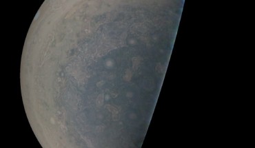 Cyclones swirl around the south pole, and white oval storms can be seen near the limb -- the apparent edge of the planet -- in this image of Jupiter’s south polar region taken by the JunoCam imager aboard NASA’s Juno spacecraft. The image was acquired on February 2, 2017, from an altitude of 47,600 miles (76,600 km) above Jupiter’s swirling cloud deck. Prior to the Feb. 2 flyby, the public was invited to vote for their favorite points of interest in the Jovian atmosphere for JunoCam to image. The point of interest captured here was titled ‘Jovian Antarctica’ by a member of the public, in reference to Earth’s Antarctica. Image credit: NASA / JPL-Caltech / SwRI / MSSS.