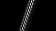 This Cassini view shows four dusty strands of Saturn’s F ring: the central strand is the core of the ring; the other strands are not independent at all, but are actually sections of long spirals of material that wrap around the gas giant; the material in the spirals was likely knocked out from the F ring’s core during interactions with a small moon. Image credit: NASA / JPL-Caltech / SSI.