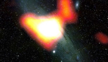NASA’s Fermi telescope has detected a gamma-ray excess (shown in yellow-white) at the center of the Andromeda galaxy that’s similar to a signature Fermi previously detected at the center of our own Milky Way Galaxy. Scientists think the signal could be produced by a variety of processes, including a population of pulsars or even dark matter. Image credit: NASA / DOE / Fermi LAT Collaboration / Bill Schoening / Vanessa Harvey / REU Program / NOAO / AURA / NSF.