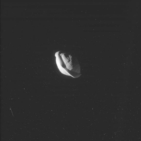 This image of Saturn’s small moon Pan was taken during the close flyby of NASA’s Cassini spacecraft on March 7, 2017, received on Earth March 8. The flyby had a close-approach distance of 15,268 miles (24,572 km). Cassini’s camera was pointing toward Pan, and the image was taken using the CL1 and CL2 filters. Image credit: NASA / JPL-Caltech / Space Science Institute.